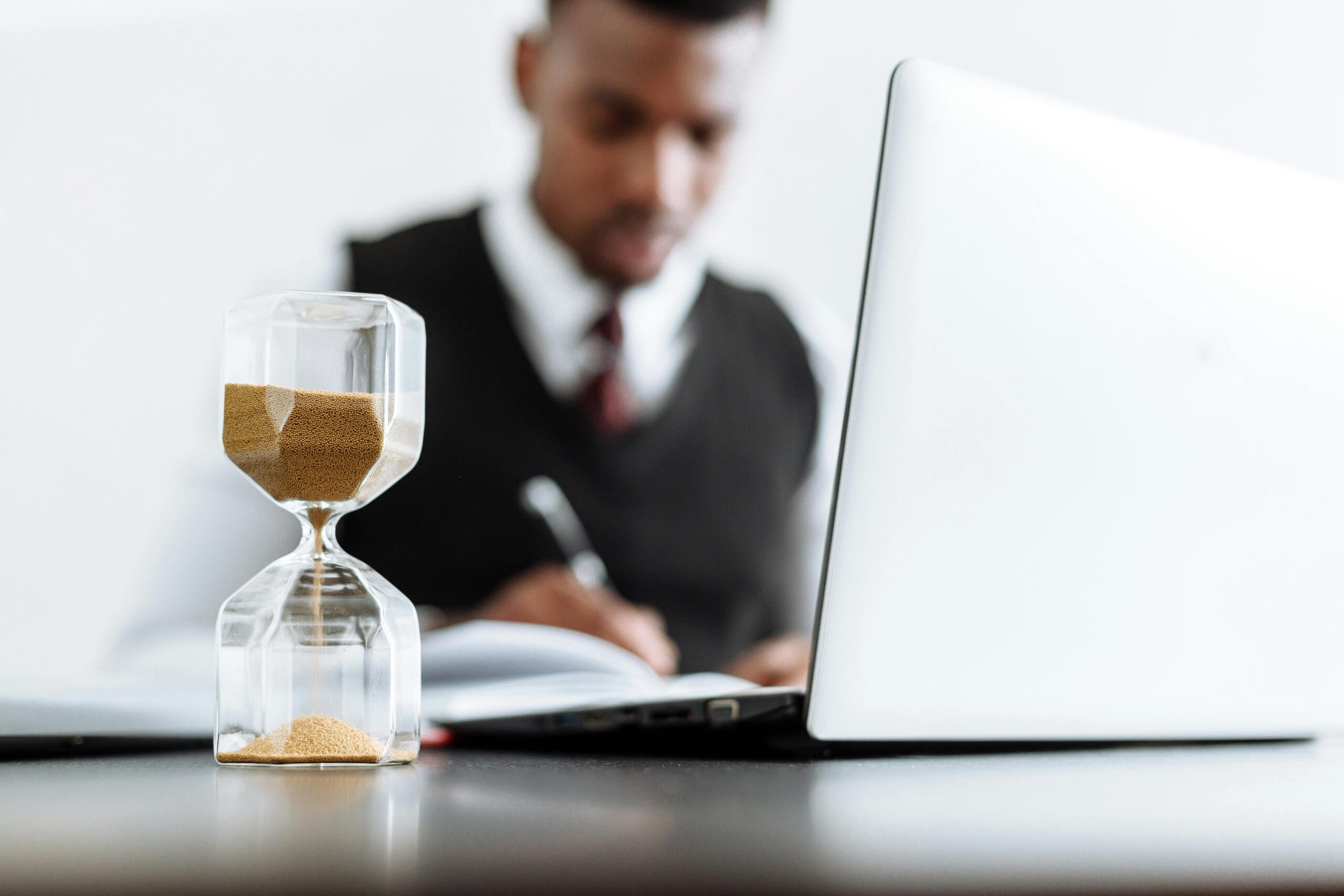 tax services for small businesses guide man with timer